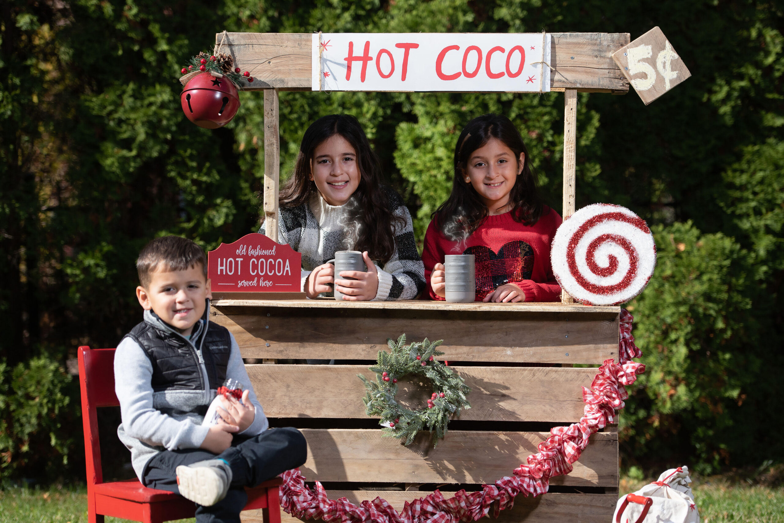 Kids at holiday hot coco stand